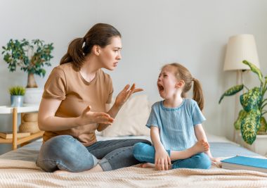 mom scolding crying child