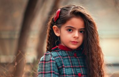 pretty little girl with curly hair